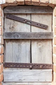 Boarded-up window close up, place under the text Stock Photos