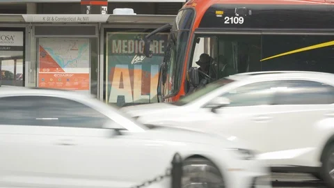 Boarding the bus Streets of Washington DC, Real Time	 Stock Footage 119513353