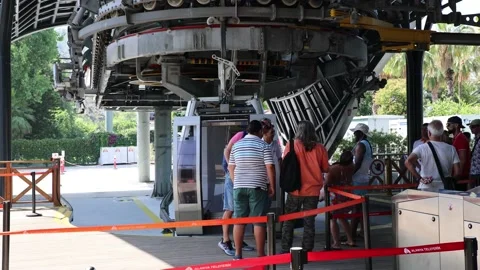 Boarding the cab on the cable car. Alanya Turkey July 2022 Stock Footage 200914196