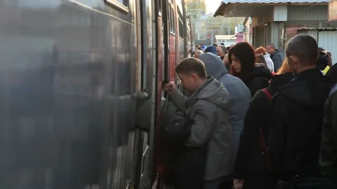 Boarding an electric train Video stock 130401993