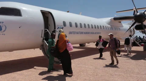 Boarding a Plane in Somalia Stock Footage 63479516