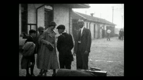 Boarding train  at station 1934 B-W 動画素材 12735539