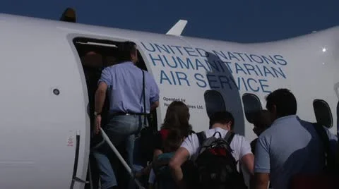 Boarding UNHAS Flight Stock Footage 22322724