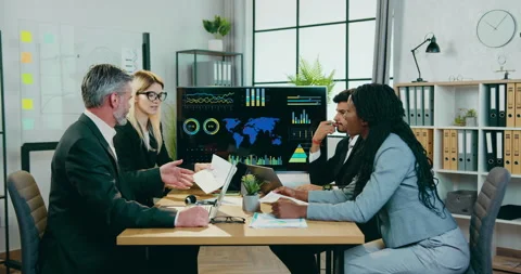 Boardroom of good-looking confident smart professional mixed race team of Stock Footage 160909528