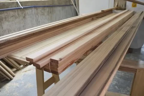 Boards, bars and lining, made of pine treated and sanded with sanding machine Stock Photos