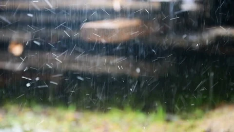 Boards get wet during heavy rain in the yard Stock Footage 134419341