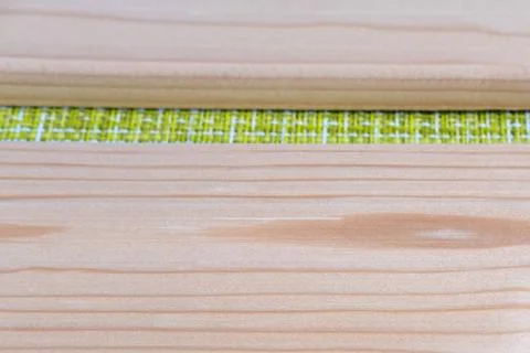 Boards on a green background. Stock Photos
