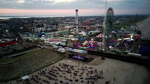 Boardwalk, Beach, and Amusement Rides, Seaside Heights, NJ, USA (aerial) Stock Footage 201307652