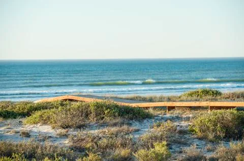 Boardwalk on the beach Stock Photos