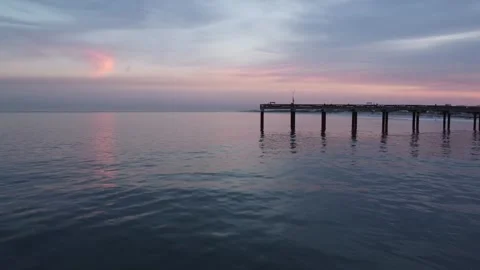 Boardwalk in the ocean at dusk Stock Footage 312027065