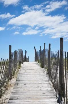 Boardwalk path to beach Stock Photos