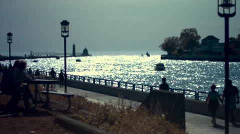 Boardwalk Pier with Lighthouse Active 4K Stock Footage 41691283