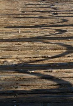 Boardwalk shadows Stock Photos