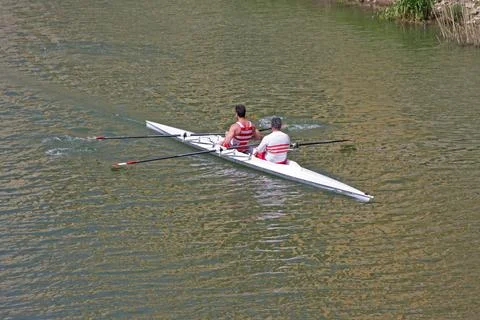 A boat for academic rowing, a pair of two without a helmsman. An academic v.. Stock Photos