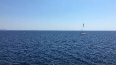 Boat in aegean blue sea Stock Footage