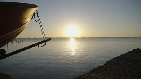 Boat and dock at sunset Stock Footage 170727952
