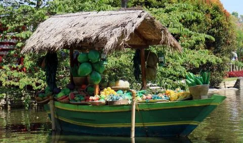 Boat and fruit Stock Photos