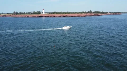 Boat and Lighthouse Stock Footage 162598958