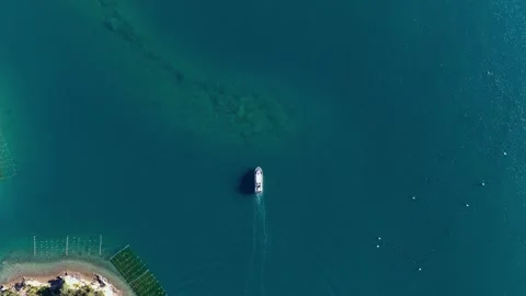 Boat and Long Wake Crossing Ago Bay, Shima, Japan Stock Footage 342236880