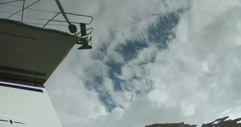 Boat and sky from underwater Stock Footage 129730123