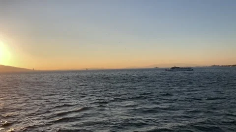 Boat and Sunset over the Aegean Sea (Slow Motion) Stock Footage 295209537