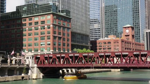 Boat and train traffic at a bridge in Chicago, Illinois Stock Footage 79700864