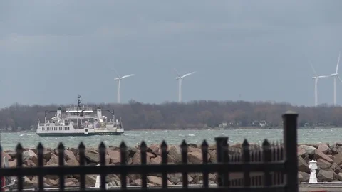 A boat and the wind turbines Video stock 79537875
