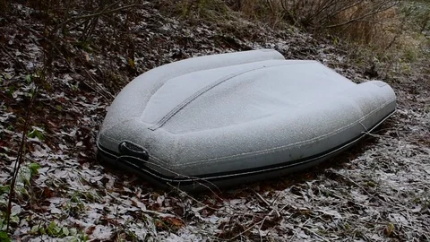 Boat ashore, first snow Stock Footage 118907529