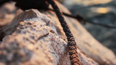 Boat attached/anchored to the stone Stock Footage 49089831