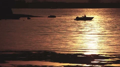 Boat in backlight on an amazing sunset 스톡 동영상 48000346