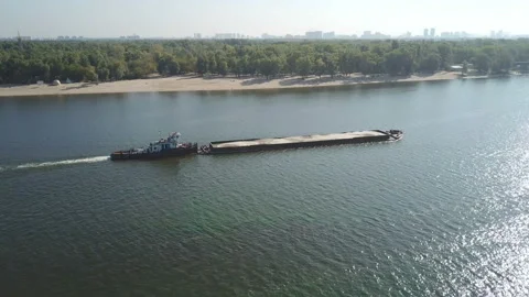 Boat with a barge on the river Dnieper 스톡 동영상 103674801