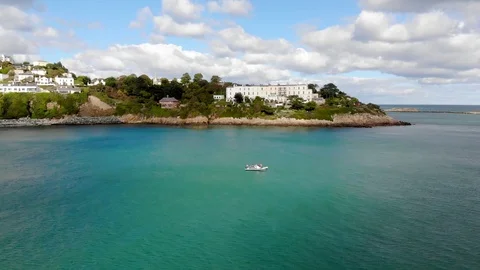 Boat on bay circle clockwise coastline and island Stock Footage 101657622