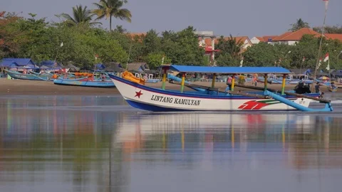 Boat on beach and palm trees in Pangandaran Java Indonesia Stock Footage 84048065