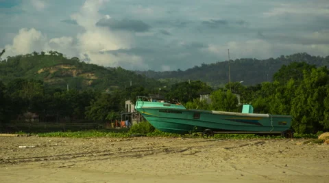 Boat on the beach. Ecuador. 4k time lapse Stock Footage 63844045