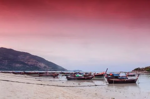 Boat on the beach in the evening Stock Photos