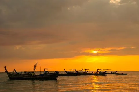 Boat at beach in evening Stock-Fotos