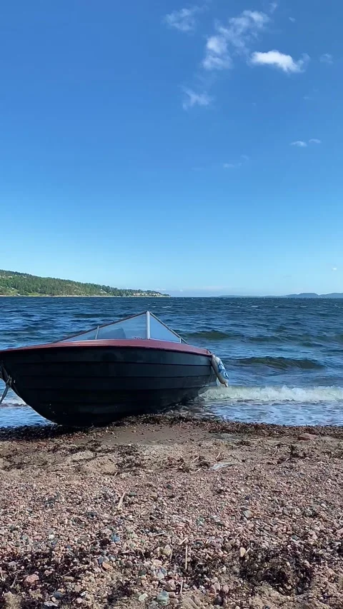 Boat on a beach in Norway Stock Footage 201625652