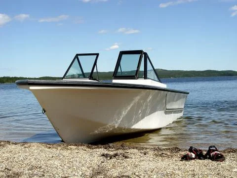 Boat on a beach Stock Photos
