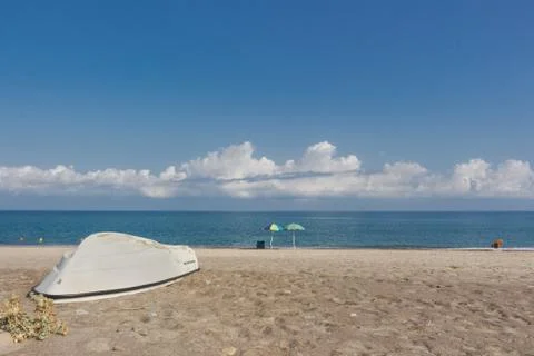 The boat on the beach Stock Photos
