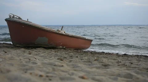 Boat on the Beach With Waves in the Background Video stock 67830653