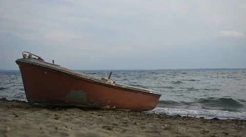 Boat on the Beach With Waves in the Background Video stock 67830713