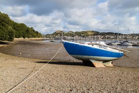 Boat beached at low tide Stock Photos