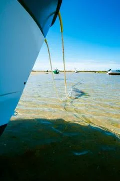 Boat between anchor line Stock Photos