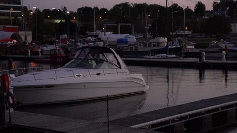 Boat in boat dock at twilight Stock Footage 140995961