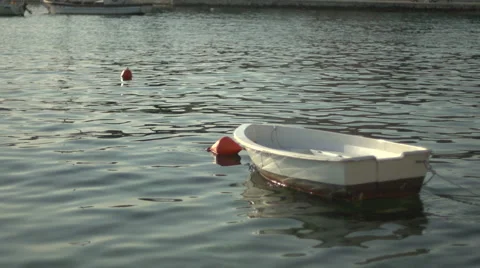 Boat bobbing in the harbor in slow motion Stock Footage 40102147