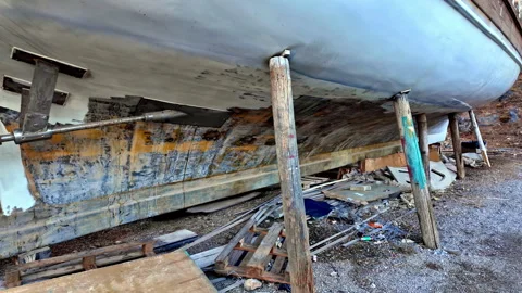 Boat body shell hull bottom structure used condition peeled paint rusted Stock Footage 285859049
