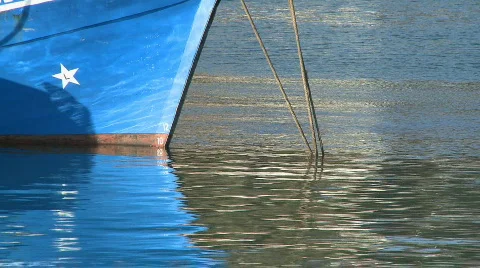 Boat bow reflected in water Stock Footage 278828