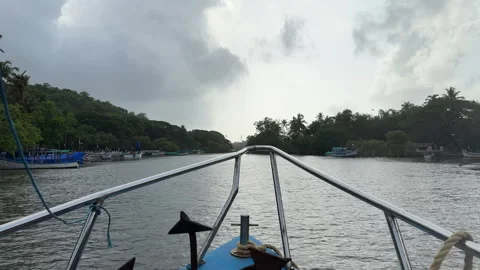 Boat Bow View Cruising On Goa River Backwaters During Monsoon With Cloudy Sky Stock Footage 345658732