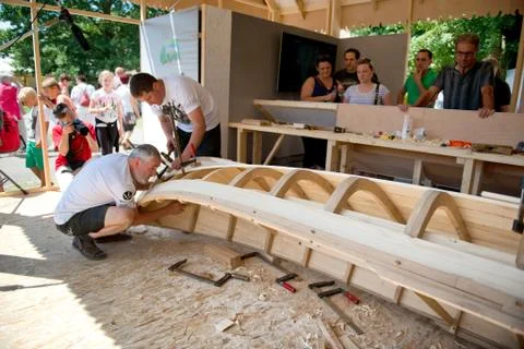 Boat builder and designer working on a boat 스톡 사진