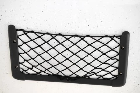 Boat bulkhead mounted mesh storage compartment Foto stock